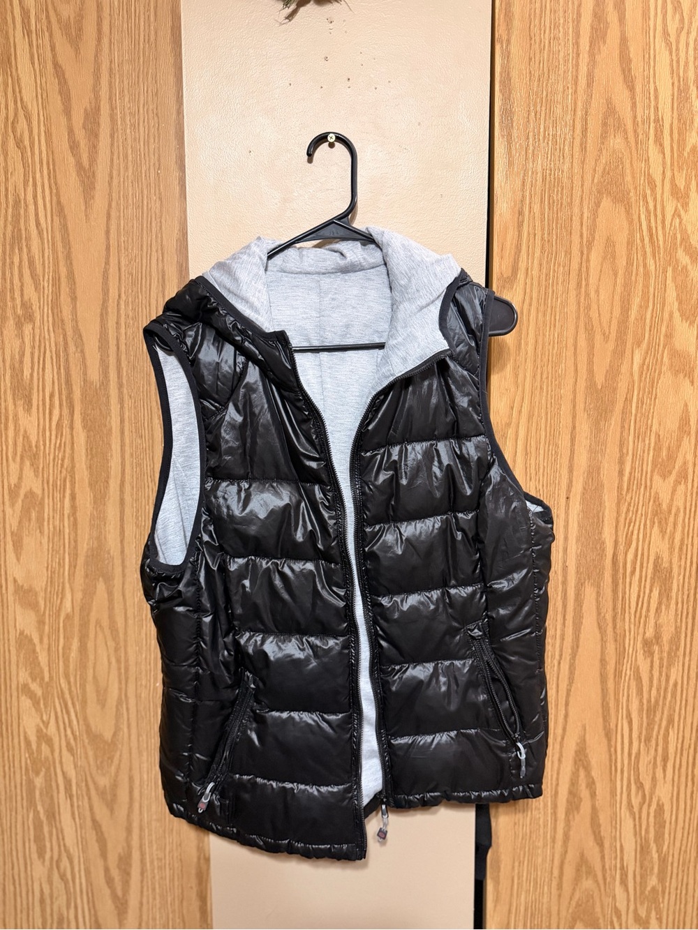 Women’s black shiny quilted puffer